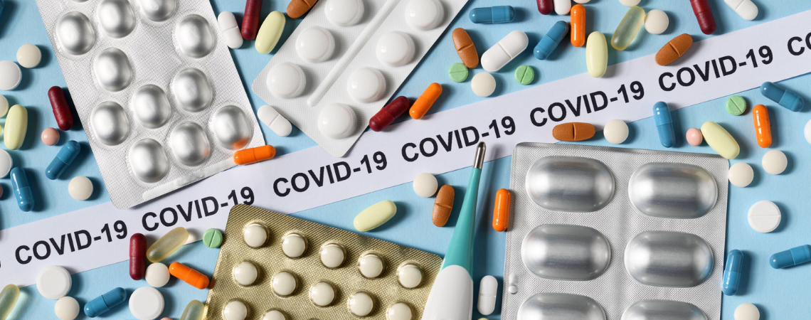 Blisters with medicines and COVID-19 tape highlighting CMDh's role in helping MAHs manage regulatory procedures during the pandemic, focusing on delays and solutions.
