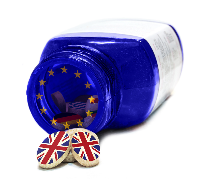 A box of capsules spilling out, each imprinted with the UK flag, symbolizing the ongoing impact of Brexit MA Holders on the pharmaceutical industry.